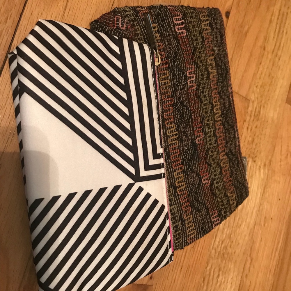 Clinique and Lancome clutches